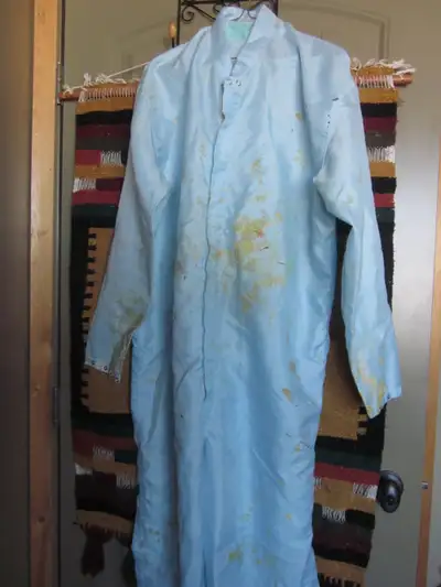 A pair of cotton coveralls with paint stains $10. Also a nylon material coveralls with paint and spr...