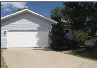 4 bedroom 3 bathroom house located in Weyburn, available August 1st
