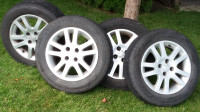 4 pneus toutes saisons sur rims Honda Civic