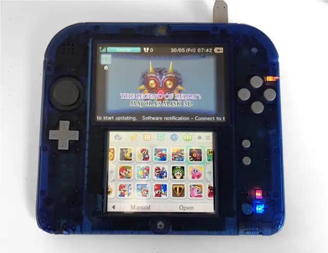 Clear Blue Nintendo 2DS with 110+ 3DS games in Nintendo Switch in Saskatoon - Image 3