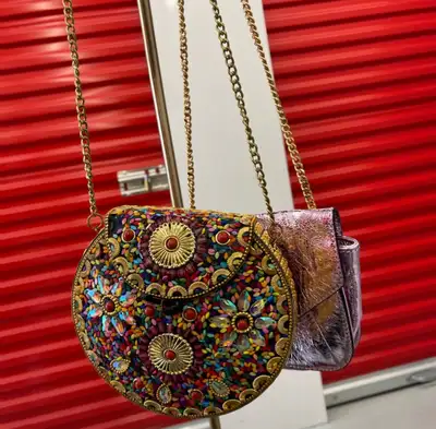 steal 2 Gold Chain Purses, View more