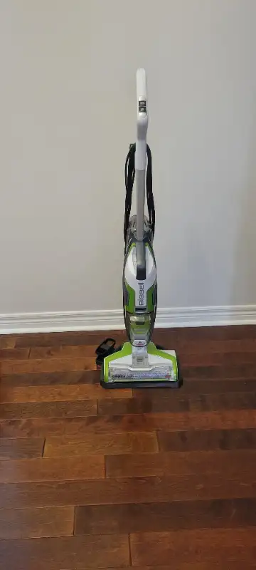 Crosswave vacuum for carpet and bare floor vacuuming and mopping at the same time. Cleaning solution...