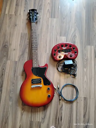 Guitar and effects POD.  Includes cables shown., View more