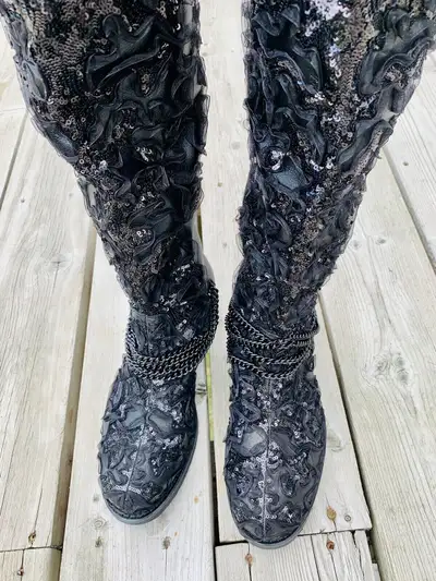 This is for a pair of Unique & Fancy “Yarra” Thigh High Black Leather with Chains, Sequins & Lace NE...