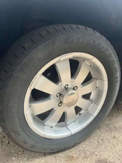 4 rims for Chevy 6 lug with 4 tires all have some tread left and some weather checking but otherwise...