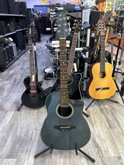 Ovation CK057 Electric Acoustic Guitar There is a crack on the body and a small crack on the neck as...