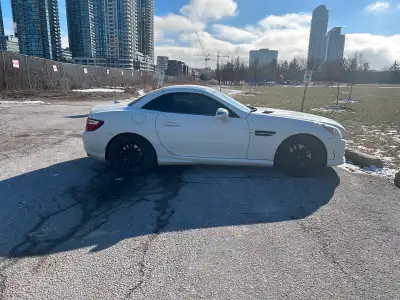 I'm selling my sleek, sporty 2012 Mercedes-Benz SLK 350 convertible, boasting a powerful engine and...