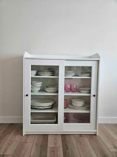 Ikea cabinet with glass doors. Basically new, in excellent condition. Pick up at Alpine Park