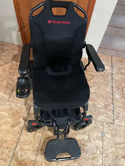 Gently used Travel Buggy Vista electric wheelchair for sale. Everything is in working order and is c...