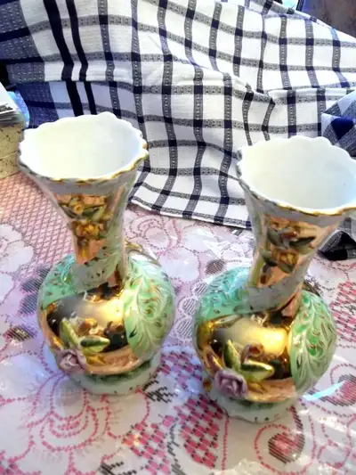 Two vintage vases are 9" h and the round one is 7 "h. Made in Portugal. In perfect shape from non sm...