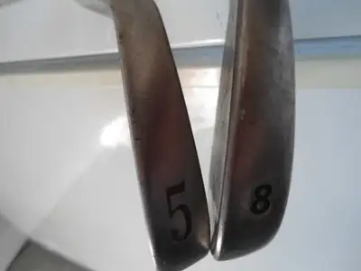 TWO RIGHT HANDED GOLF TRAINING IRONS, View more