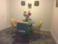 5-PIECE DINING PACKAGE WITH MULTICOLOR CHAIRS!
