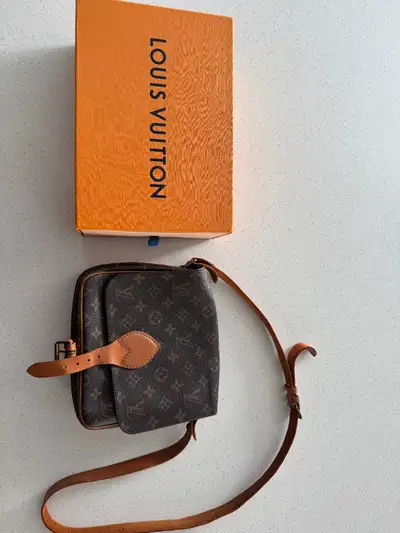 Authentic Louis Vuitton crossbody bag. Smoke free home. Pick up near Kingsville