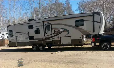 2015 K-Z Durango 345SE fifth wheel, 36'8" long with 3 slides, front bedroom with queen bed and large...
