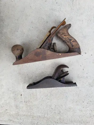 Couple vintage metal plane woodworking tools. STANLEY AND NATIONAL