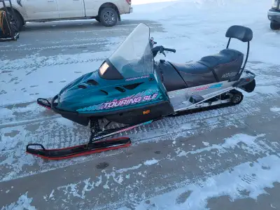 1994 SLE Touring. 500 fan cooled. Dual carb. Electric start, reverse, heated grips. New skags and ti...