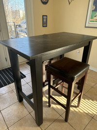 Bar height table with stools