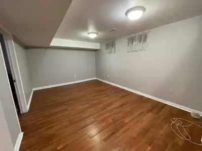 WARDEN/MCNICOLL 2 BEDROOM + DEN BASEMENT APARTMENT FOR RENT