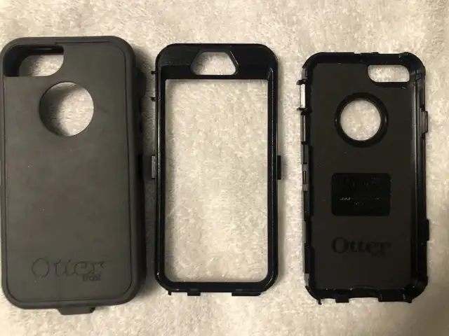 iPhone 5s with an Otterbox and an extra case 62863734263169122