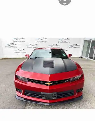 A beautiful 2015 Camaro SS 1LE. A beautiful red paint colour with a black hood and black accents. It...