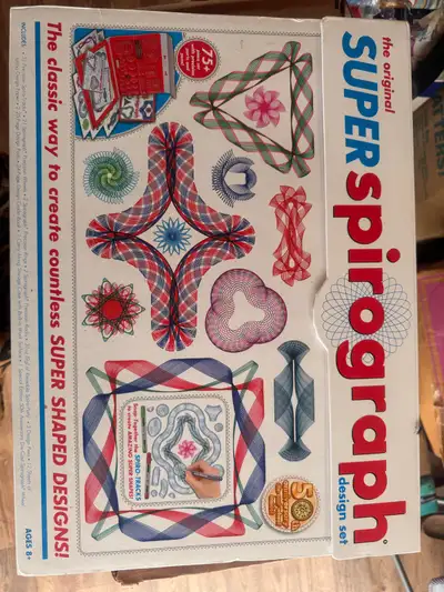Spirograph 50th anniversary edition, like new. All pieces are included, two pads of design paper, de...
