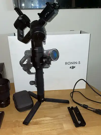 Capture smooth, professional-quality video with this DJI Ronin-S Gimbal Stabilizer, designed for DSL...