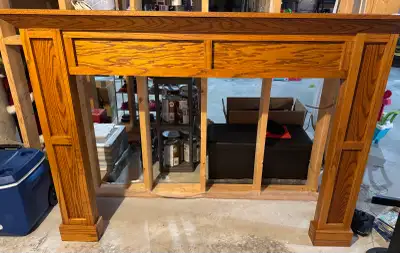 Selling in great condition fireplace mantal surround in wood. Very heavy must help carry out and mus...