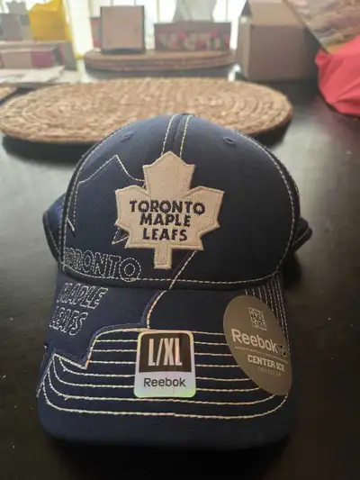 Reebok Toronto Maple Leafs cap. Bolland autograph., View more