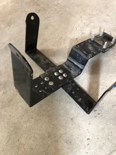 Black metal rear carry rack for quad. Holds gas jug or cooler. Bolt on style. In great condition