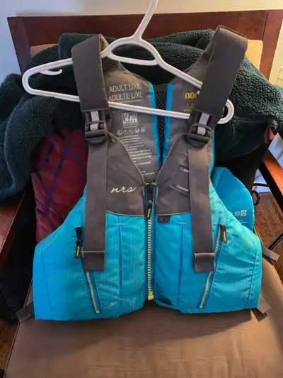 Selling a used NRS Nora life jacket, adult size L/XL, in good condition, providing a comfortable and...