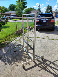 Used adjustable clothing rack