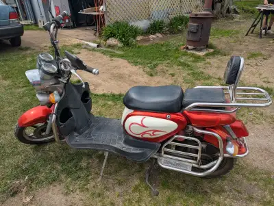 Electric scooter - works but needs a battery. Functional from 48V to 90V, but battery meter is for 6...