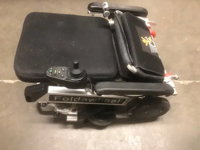 Power wheel chair that folds up62863282050562124
