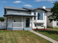 Beautiful Red Deer Home with Revenue Generating Suite!