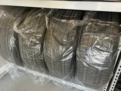 These Pirelli Scorpion Winter tires, sized 275/45 R21, are used and ready to keep you safe on the ro...