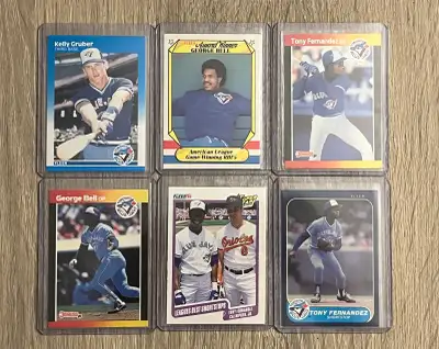 Up for grabs is a lot of vintage Toronto Blue Jays baseball cards, showcasing players like Kelly Gru...
