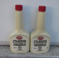 $20 Pair of sealed vintage 1980's STP bottles