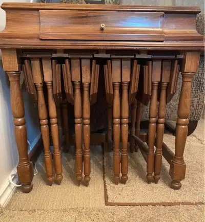 antique side table plus 4 small table tuck in. $250. Located wes, View more