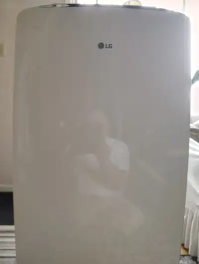 Almost new 14 000 B T U portable air conditioner on rollers, View more