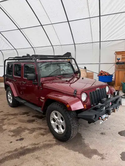 2010 Jeep Wrangler Sahara Unlimited. 3.8L 6 cylinder, 6 speed manual. 4x4 power windows, locks, keyl...