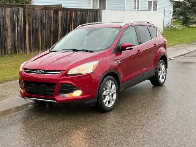 I am selling my 2014 Ford Escape Titanium. Fully loaded has leather, AWD, heated seats, panoramic su...