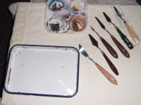 Artist used paints/ palette knives and trays