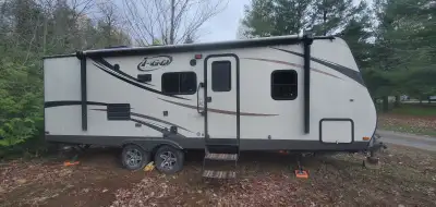 A great used trailer for a couple or young family starting out. You enter the trailer and to the rig...