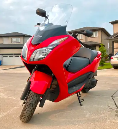 2014 Honda Forza 300 ABS Mileage: 13527km Engine: 279cc Clean Title, Fresh Safety. Scooter in mint c...