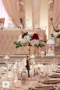 Silk floral centrepieces & gold stands