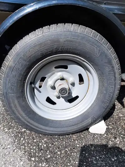 Arisun 175/80 13 inch galvanized wheel and tire. Load range 6, 1360 lb. capacity. Date stamped 31st...
