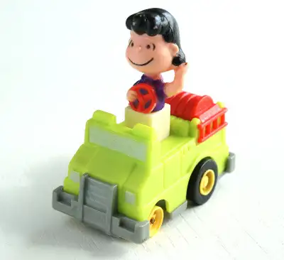 FOR SALE: VINTAGE 1966 Lucy in Fire Truck Toy - A McDonald's toy in 1989. CONDITION: Great used cond...