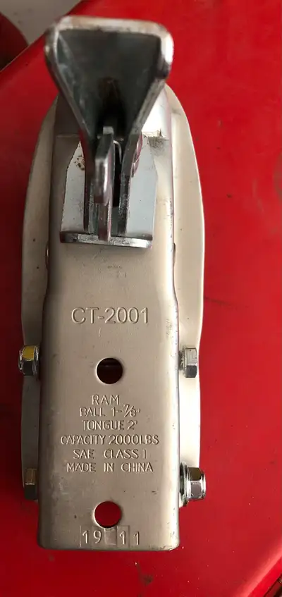Brand new. Never used. Switch with a 2” coupler Is 2” wide to fit on a utility trailer