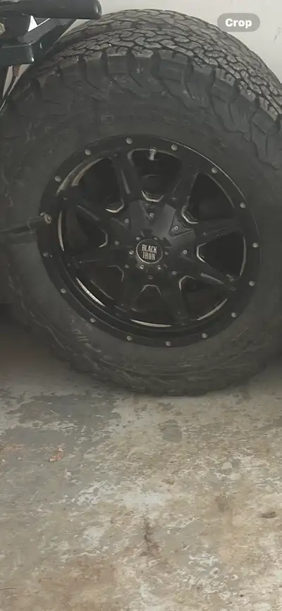 Selling my black iron 18 inch rims. Fits Chevy 1500 6 bolt. Tires are 275/65r18 bfg One is brand new...