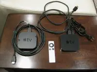 2 Apple TV Boxes with Cables and One Remote - 2nd. Gen
